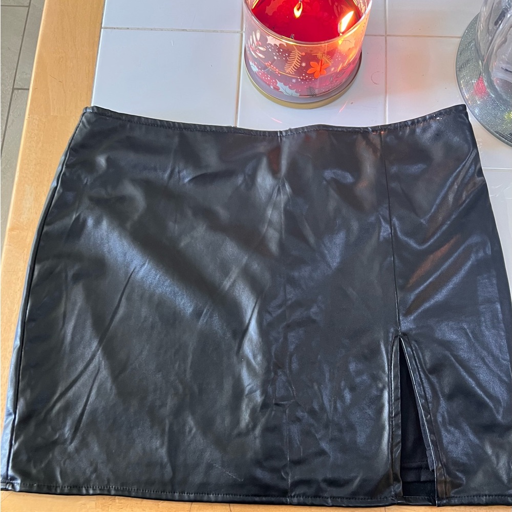 New,never worn fashionova leather mini skirt